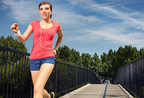 getty_rm_photo_of_teen_girl_running_across_bridge