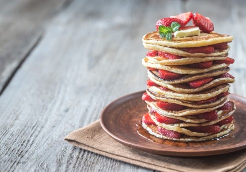 80156290 - stack of pancakes with fresh strawberries on the plate
